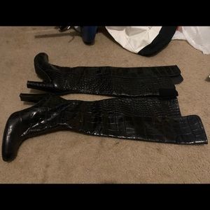 Knee high black leather boots